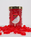 Cherry Bliss Gummy Tube with cherry gummies in front on white background