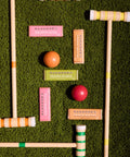 chocolate bars on grass with croquet equipment