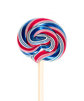 Red, white, and blue striped lollipop on a white background