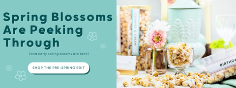 Promotional banner with text 'Spring Blossoms Are Peeking Through' and a product display on a teal background.