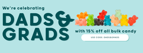 Promotional banner celebrating 'Dads & Grads' with colorful gummy bears and a discount offer on bulk candy.