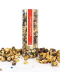 Candy Crunch popcorn in a clear cylindrical container with a red label on a white background