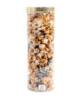 Tall cylindrical container filled with assorted popcorn flavors on a white background