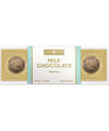 4 piece milk chocolate truffle set on white background