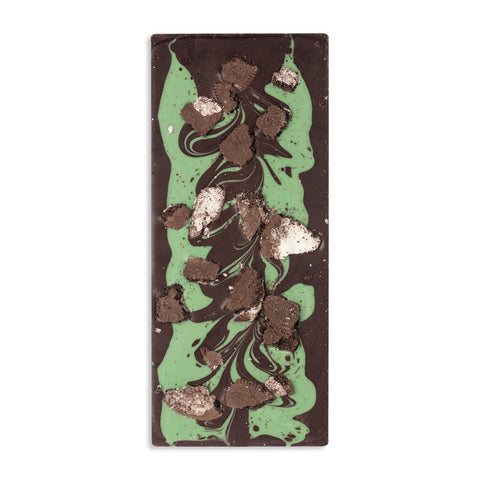 Chocolate bar with green and brown marbled pattern on a white background