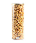 Cylindrical container filled with popcorn on a white background