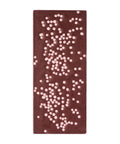 Chocolate bar with white chocolate chips on a white background