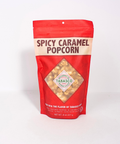 Red package of spicy caramel popcorn with Tabasco branding on a white background