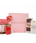 Collection of Lolli & Pops products including marshmallows, lollipop, and chocolate bars on a white background.